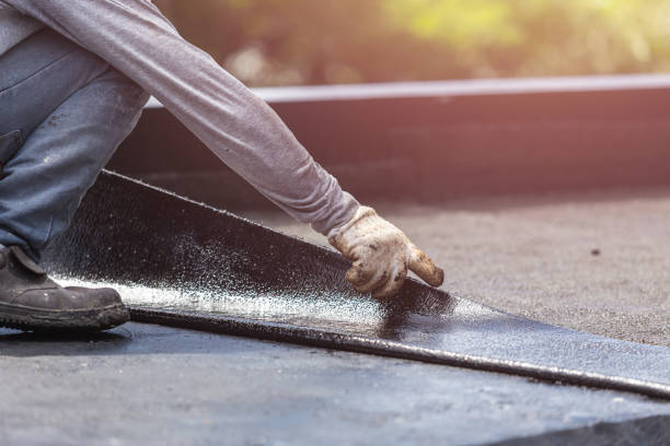 Professional Exterior Waterproofing technician working in Marietta, NY